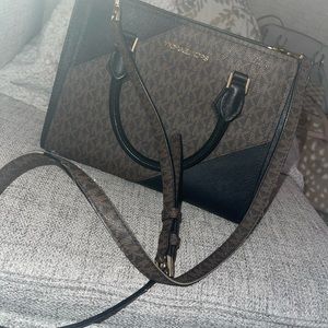 Black and Brown logo purse with Gold accents